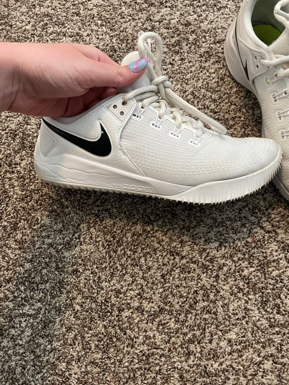 Nike White Trainers with Black Swoosh